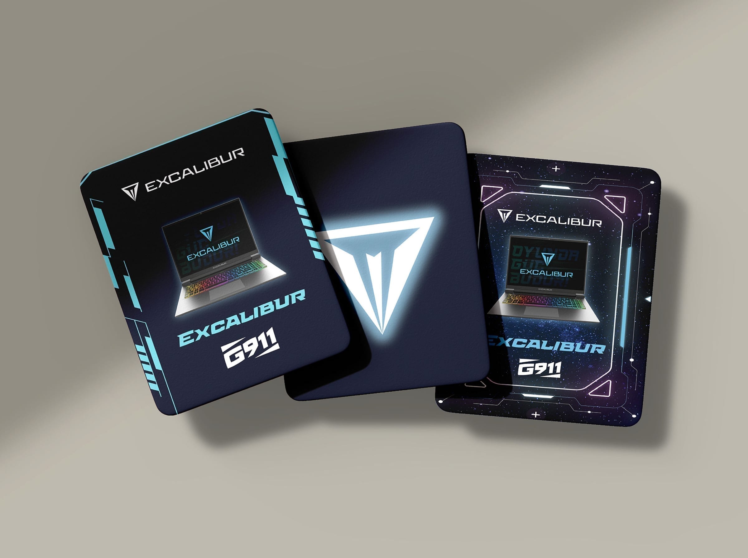 Three Excalibur campus tour cards arranged in a dramatic composition, showing the faces with bold geometric graphics.
