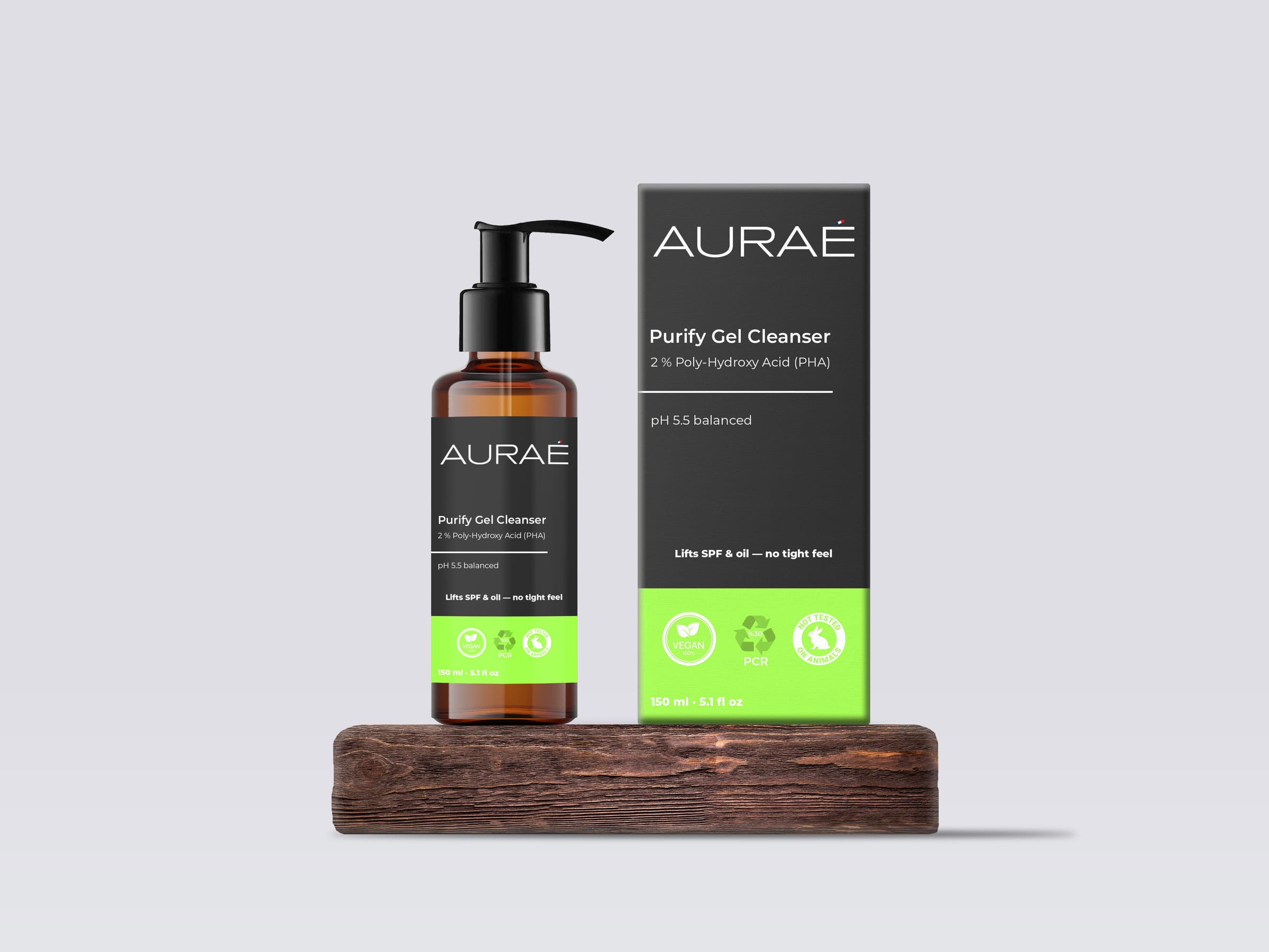 AURAÉ Purify Gel Cleanser bottle and box on a wooden block, with matte-black packaging and a bright lime accent band.