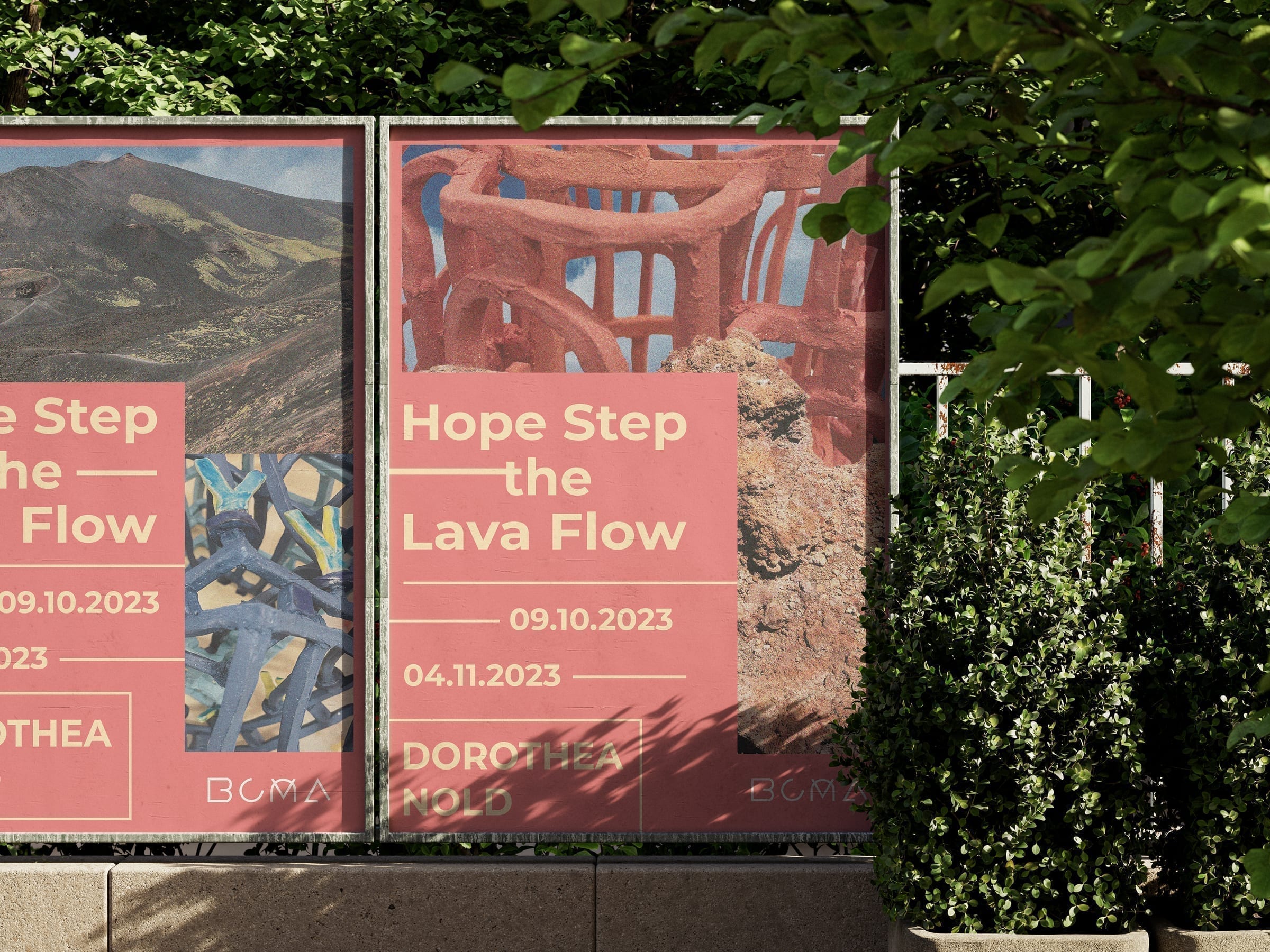 Posters displayed in an outdoor environment, framed by greenery.