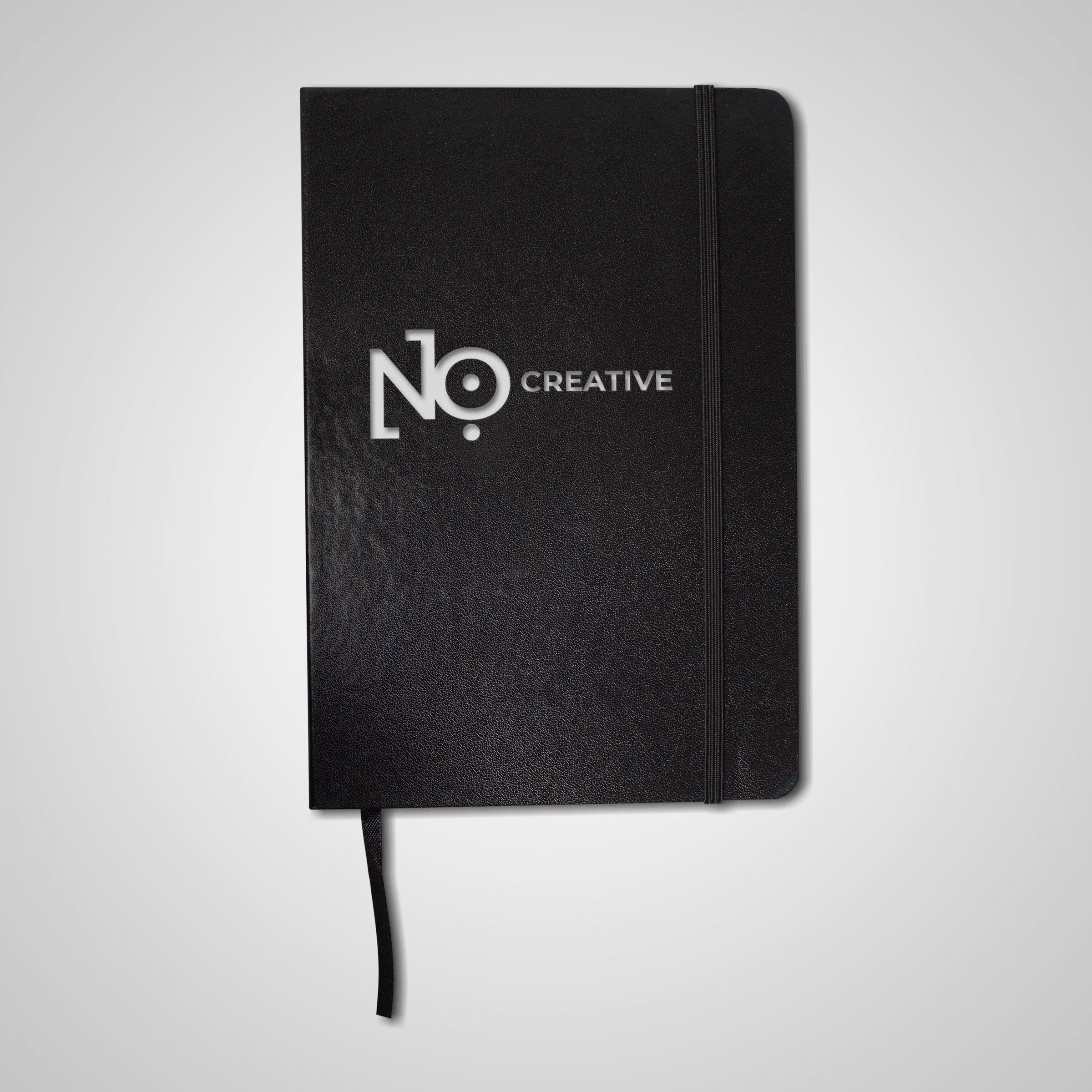 NO:118 Creative branded notebook, black cover with silver foil logo stamp and elastic closure.